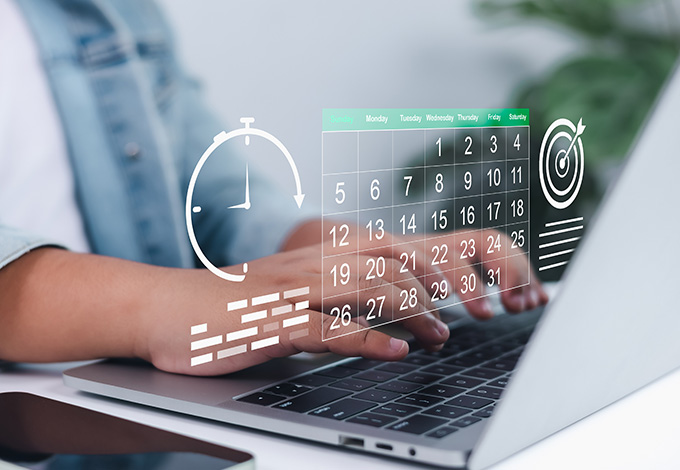 person typing on a laptop with a digital calendar and timer graphic displaying productivity and time management concepts