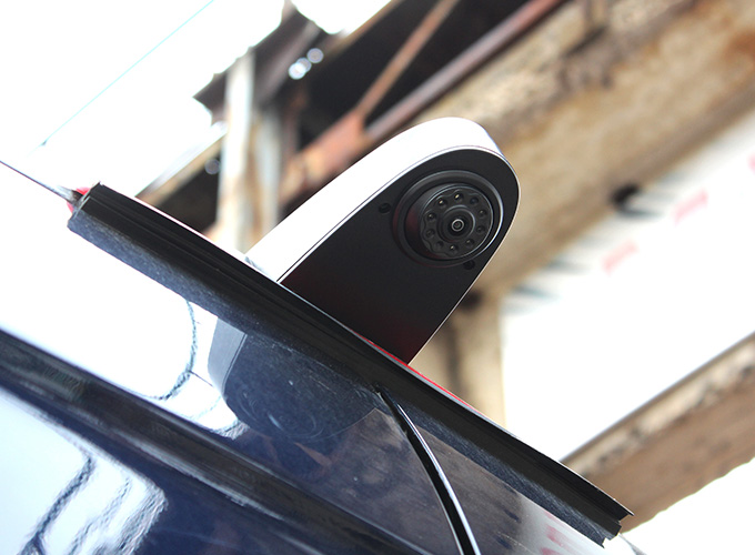 car rearview camera mounted on vehicle showing design and technology features for safety and surveillance in six areas